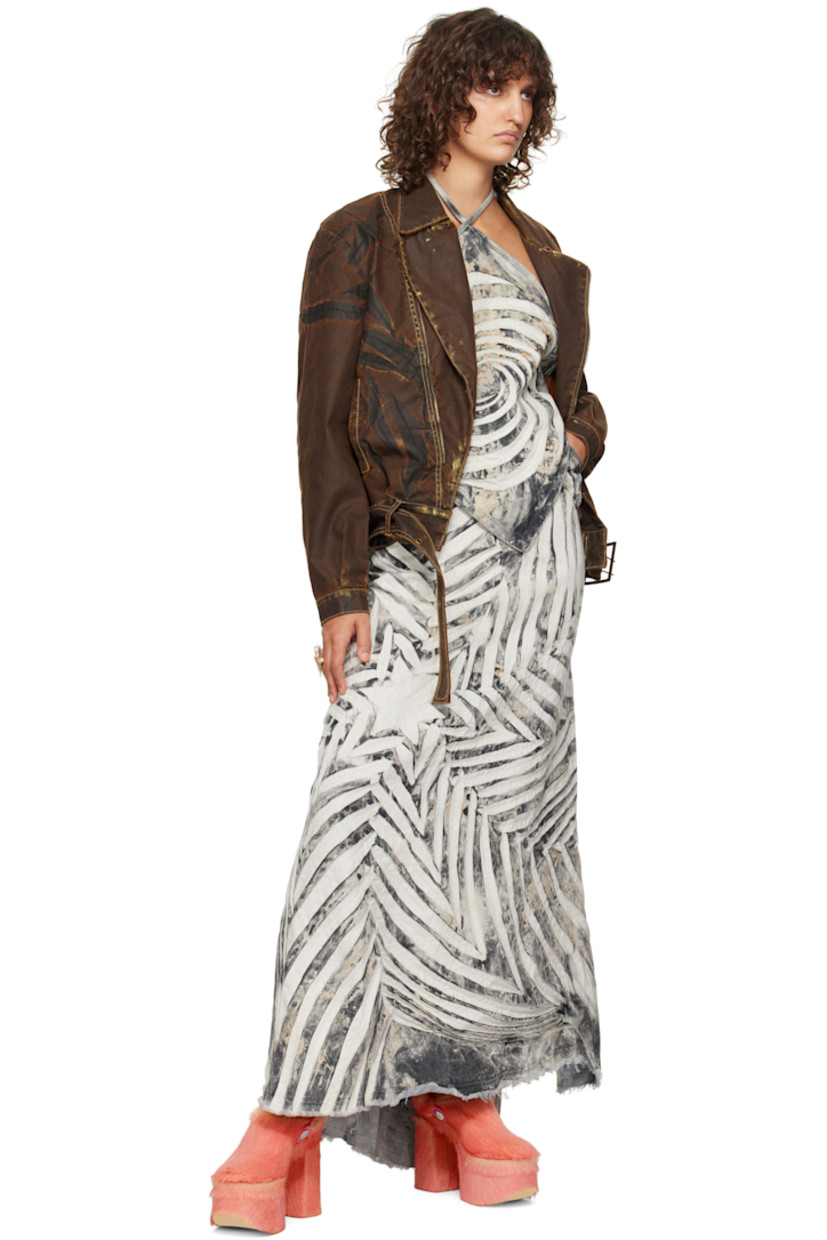 Recycled cotton-blend canvas jacket. Smudging, fading, and creasing throughout.

· Paneled construction
· Spread collar
· Offset zip closure
· Welt pockets
· Pin-buckle belt and belt loops at hem
· Pleats at single-button barrel cuffs
· Contrast stitching in yellow

Supplier color: Bronzed espresso