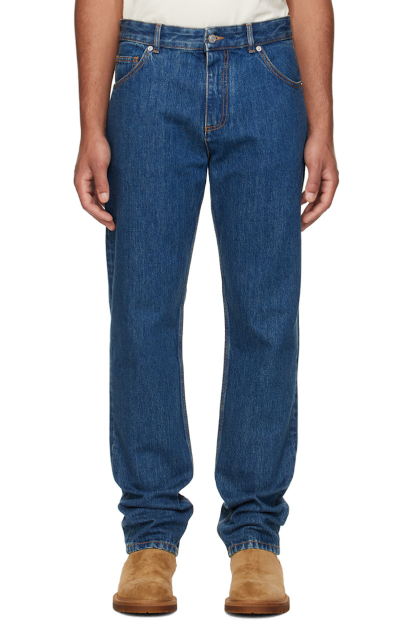 Non-stretch denim jeans.

· Belt loops
· Five-pocket styling
· Zip-fly
�· Logo patch at back waistband
· Logo-engraved silver-tone hardware
· Contrast stitching in tan

Supplier color: Denim