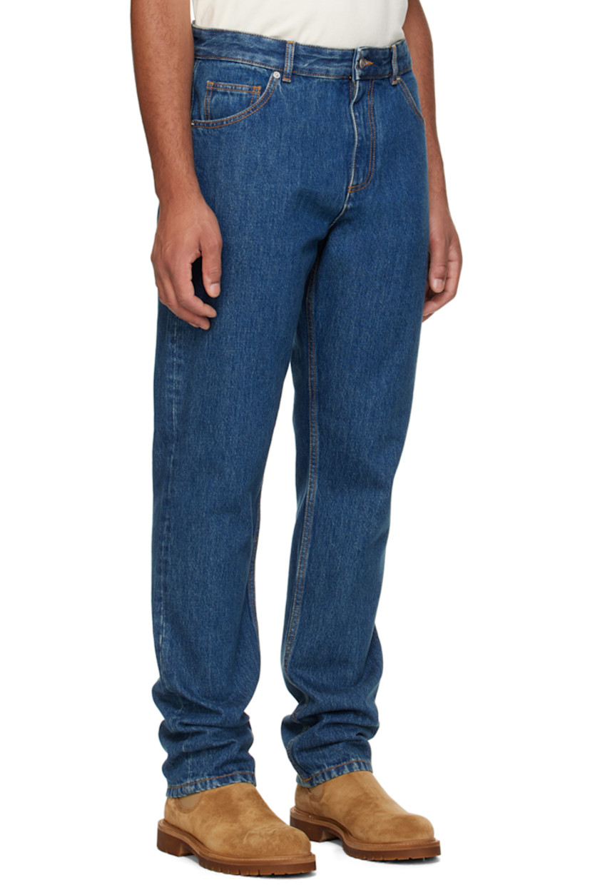 Non-stretch denim jeans.

· Belt loops
· Five-pocket styling
· Zip-fly
· Logo patch at back waistband
· Logo-engraved silver-tone hardware
· Contrast stitching in tan

Supplier color: Denim