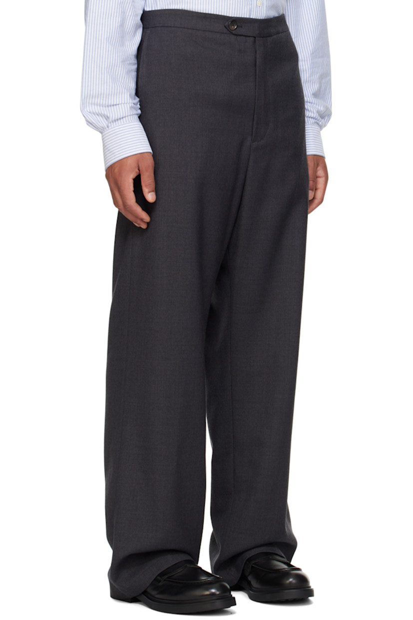 Loose-fit wool- and polyester-blend twill trousers.

· Partially elasticized waistband
· Three-pocket styling
· Zip-fly
· Logo flag at back pocket

Supplier color: Dark grey
