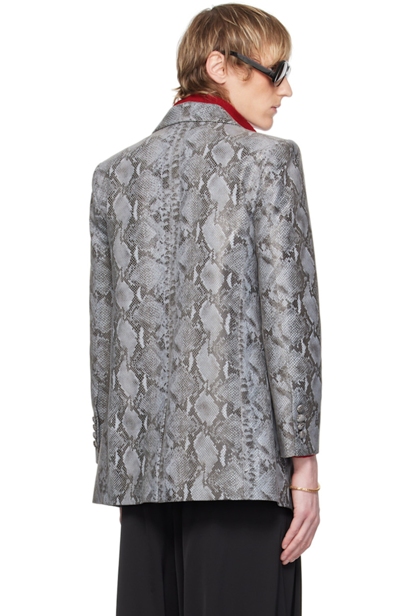 Snake-embossed lambskin blazer.

· Notched lapel
· Two-button closure
· Flap pockets
· Padded shoulders
· Four-button surgeon's cuffs
· Central vent at back hem
· Fully lined 

Available exclusively at SSENSE.

Supplier color: Python