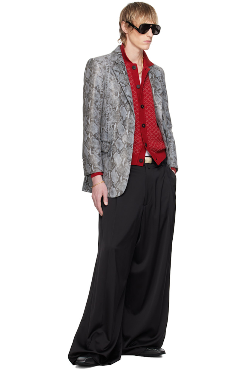 Snake-embossed lambskin blazer.

· Notched lapel
· Two-button closure
· Flap pockets
· Padded shoulders
· Four-button surgeon's cuffs
· Central vent at back hem
· Fully lined 

Available exclusively at SSENSE.

Supplier color: Python