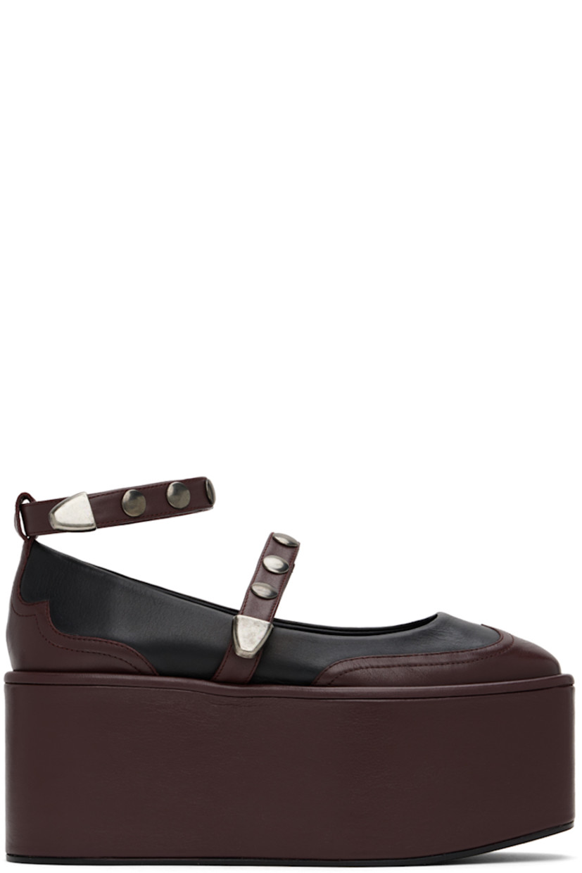 Paneled grained leather ballerina flats in black and brown.

· Press-stud strap at vamp
· Detachable press-stud ankle strap
· Grained leather and suede lining
· Logo embossed at padded leather footbed
· Covered platform midsole
· Nubuck sole
· Platform: H3.25"

Supplier color: Black/Brown