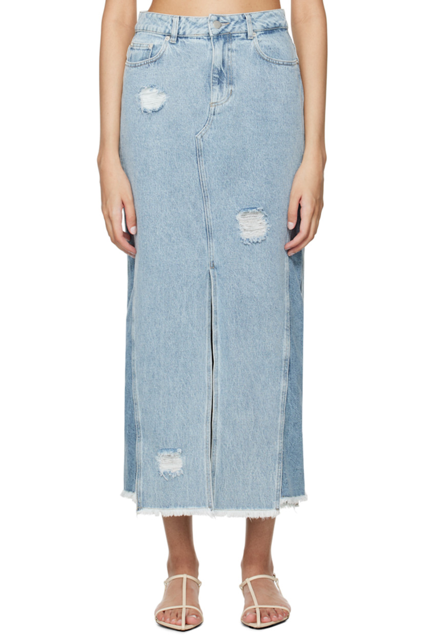 Non-stretch denim skirt. Fading and distressing throughout. 

· Mid-rise
· Belt loops 
· Five-pocket styling 
· Zip-fly 
· Vented front hem 
· Raw edge at hem 
· Jacron logo patch at back waistband 
· Silver-tone logo-engraved hardware 
· Contrast stitching in tan 

Supplier color: Light blue mix