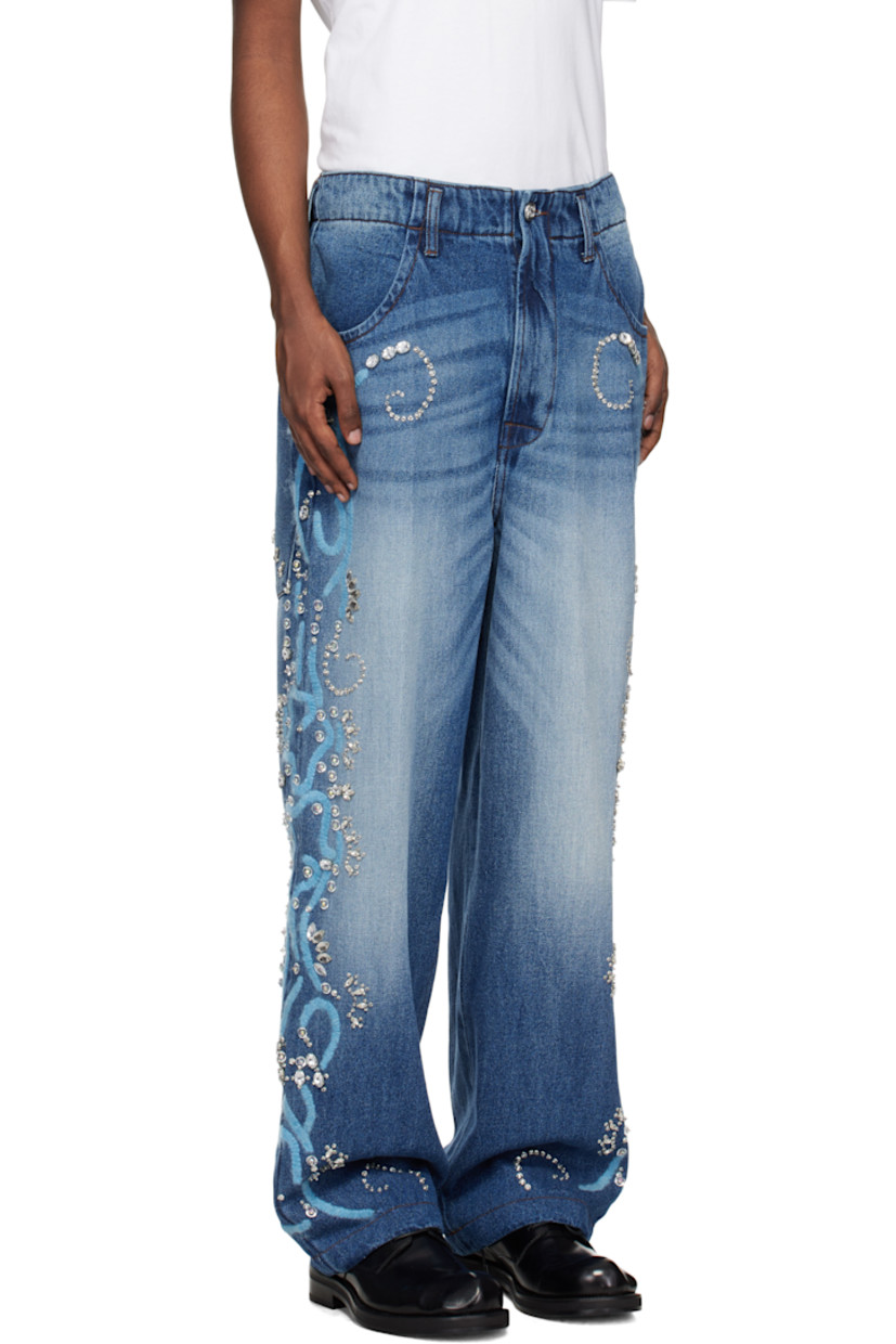 Relaxed-fit stonewashed non-stretch denim jeans. Fading and whiskering throughout.

· Belt loops
· Four-pocket styling
· Zip-fly
· Crystal-cut detailing at front and outseams
· Hand-embroidered detailing at outseams
· Leather logo patch at back waistband
· Logo printed at back pocket

Supplier color: Stonewash blue