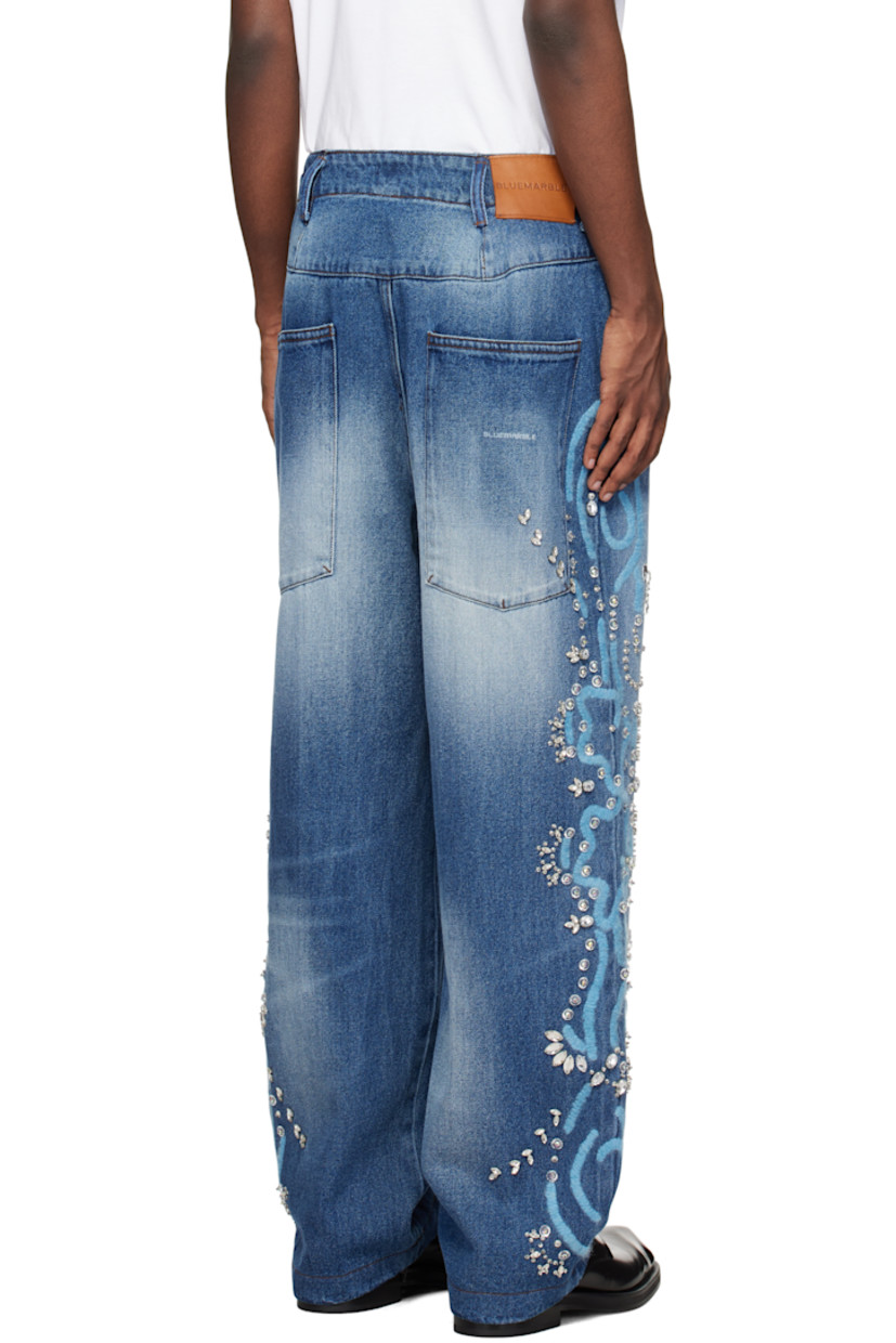 Relaxed-fit stonewashed non-stretch denim jeans. Fading and whiskering throughout.

· Belt loops
· Four-pocket styling
· Zip-fly
· Crystal-cut detailing at front and outseams
· Hand-embroidered detailing at outseams
· Leather logo patch at back waistband
· Logo printed at back pocket

Supplier color: Stonewash blue