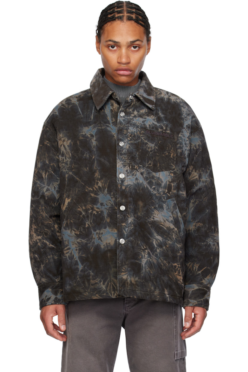 Textured cotton corduroy overshirt. Tie-dye pattern printed throughout.

· Spread collar
· Press-stud closure
· Logo embroidered at patch pocket
· Welt pockets
· Dropped shoulders
· Press-stud fastening at pleated barrel cuffs
· Patch pocket at interior
· Full quilted satin lining
· Logo-engraved silver-tone hardware

Supplier color: GRY
