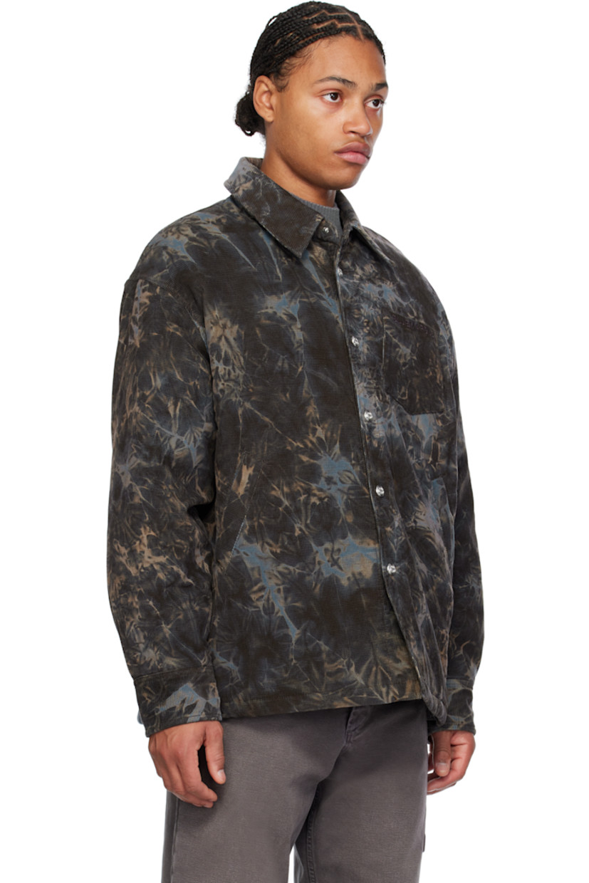 Textured cotton corduroy overshirt. Tie-dye pattern printed throughout.

· Spread collar
· Press-stud closure
· Logo embroidered at patch pocket
· Welt pockets
· Dropped shoulders
· Press-stud fastening at pleated barrel cuffs
· Patch pocket at interior
· Full quilted satin lining
· Logo-engraved silver-tone hardware

Supplier color: GRY