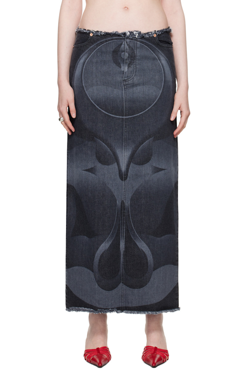Non-stretch denim skirt. Graphic pattern printed throughout.

· Frayed edge at waist and hem
· Four-pocket styling
· Button-fly
· Vented side seam
· Logo patch at back waistband

Supplier color: Black