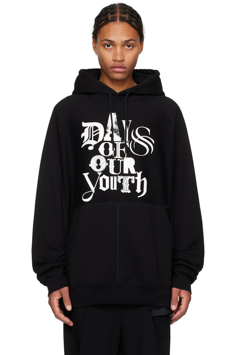 Oversized French terry hoodie. 

· Drawstring at hood
· Text printed at front
· Patch pockets
· Rib-knit hem and cuffs 
· Raglan sleeves 

Supplier color: Black