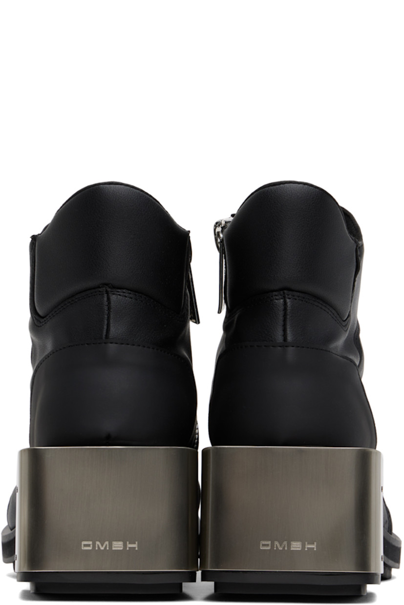 Ankle-high buffed faux-leather boots in black.

· Inset padded panels at vamp
· Padded heel collar
· Logo embossed at outer side
· Zip closure at inner side
· Logo embossed at padded footbed
· Logo plaque at block heel
· Stacked faux-leather and rubber midsole
· Faux-leather sole with treaded rubber injection
· Logo-engraved silver-tone hardware
· Heel: H2.5"

Supplier color: Black