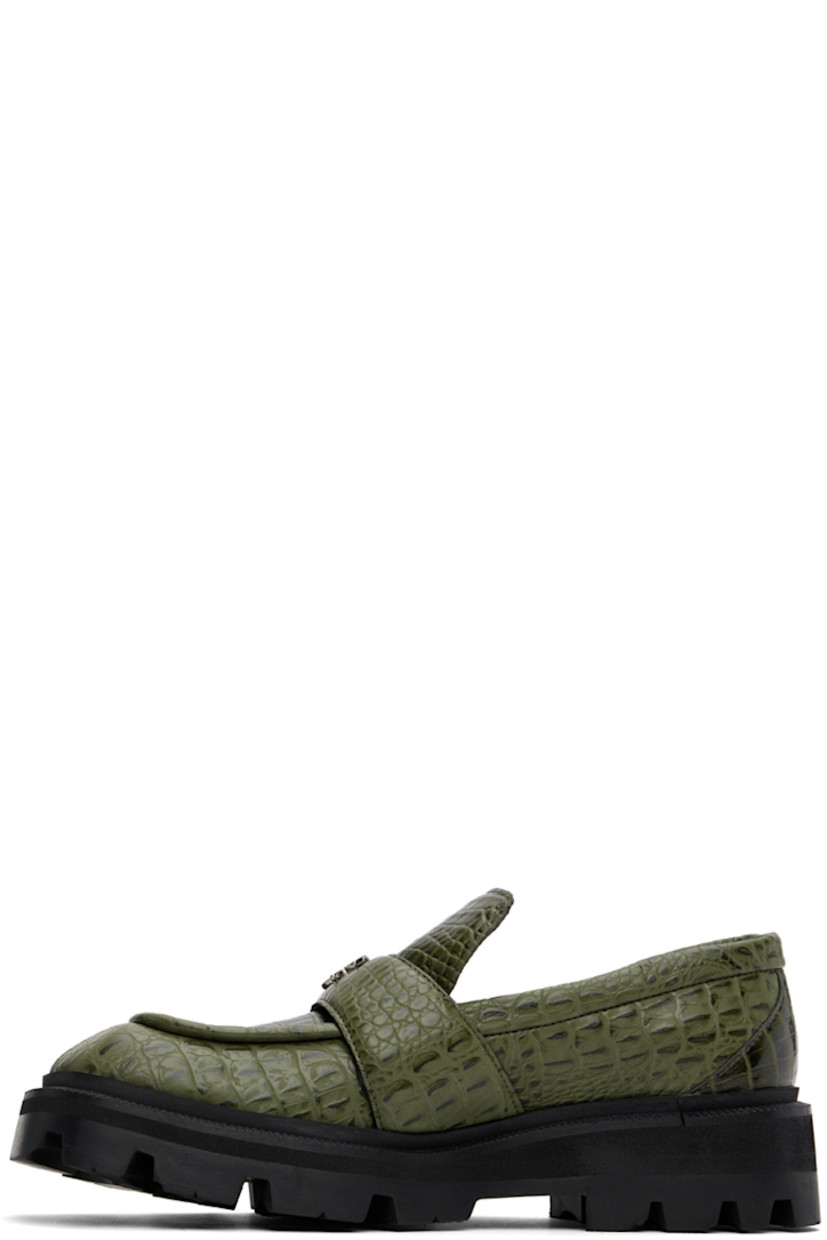 Croc-embossed faux-leather loafers in green.

· Square moc toe
· Logo hardware and strap at vamp
· Logo embossed at padded footbed
· Foam rubber midsole
· Lugged rubber sole
· Heel: H2.75"

Supplier color: Green