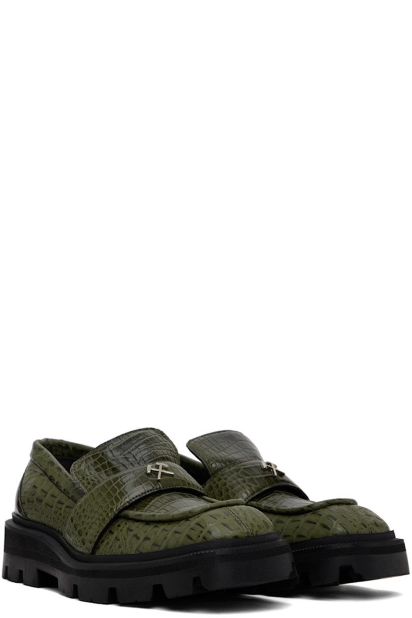 Croc-embossed faux-leather loafers in green.

· Square moc toe
· Logo hardware and strap at vamp
· Logo embossed at padded footbed
· Foam rubber midsole
· Lugged rubber sole
· Heel: H2.75"

Supplier color: Green