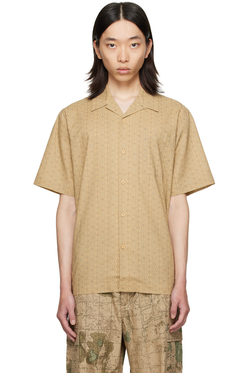 Lightweight cotton shirt. Jacquard graphic throughout.

· Open spread collar
· Button closure 
· Patch pocket

Supplier color: Ecru