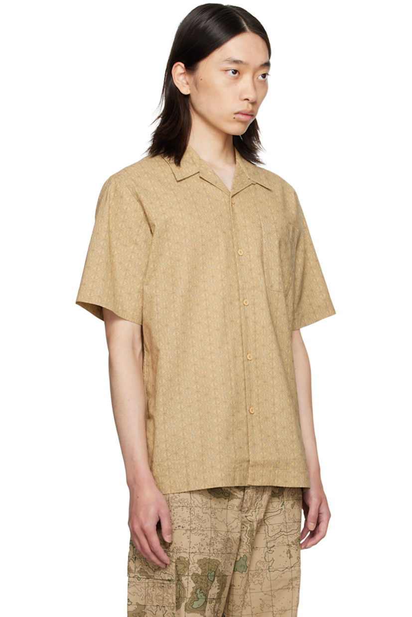 Lightweight cotton shirt. Jacquard graphic throughout.

· Open spread collar
· Button closure 
· Patch pocket

Supplier color: Ecru