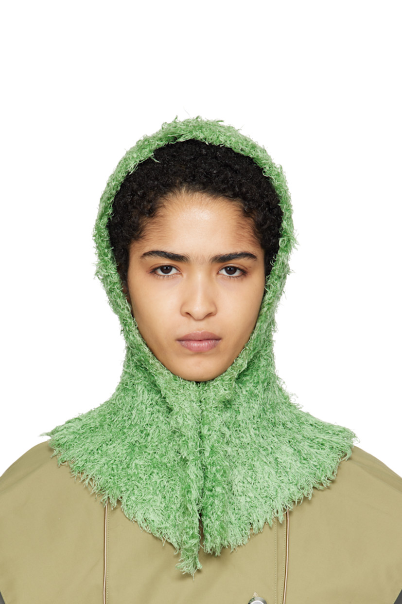 Shag-knit silk hood in green. Button fastening at collar.

Supplier color: Jade