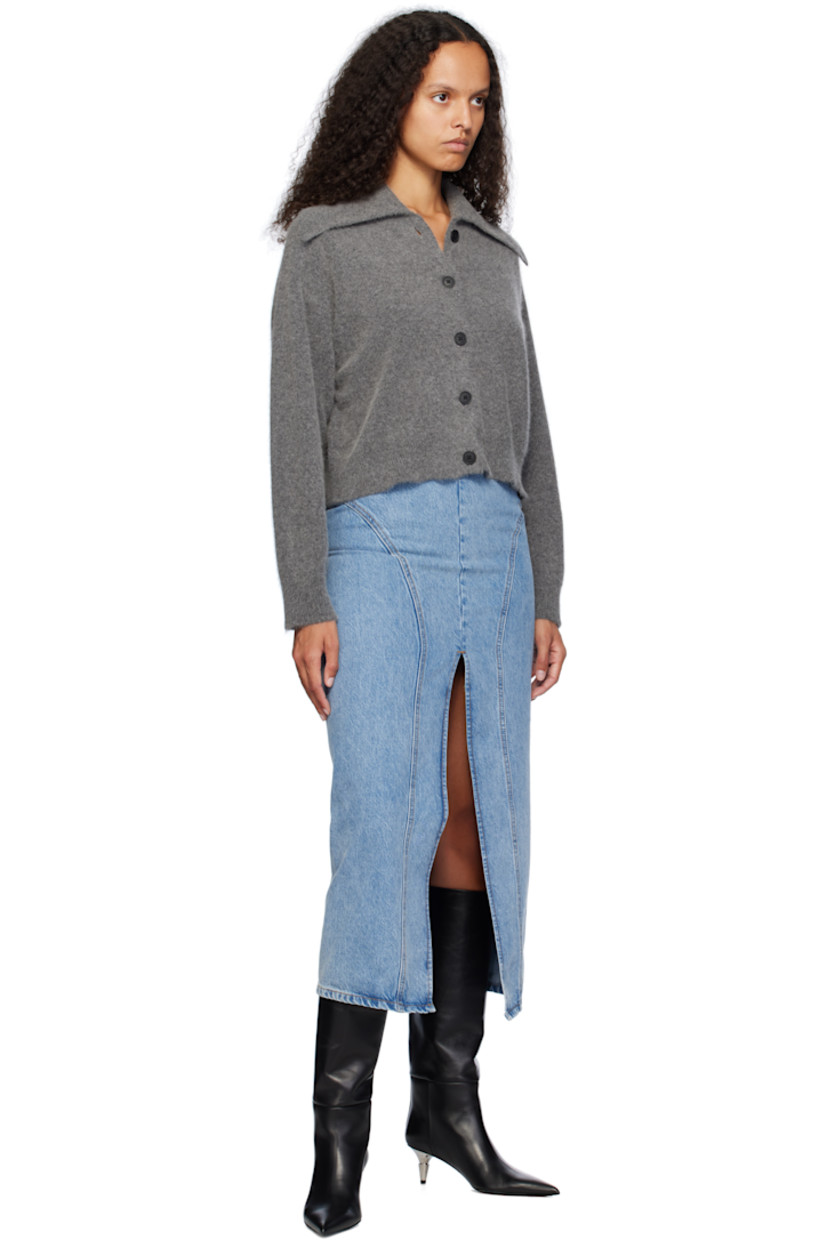 Non-stretch organic cotton-blend denim midi skirt.

· Slim-fit
· Paneled construction
· Slit at front hem
· Concealed zip closure at back waistband
· Contrast stitching in tan

Supplier color: Faded denim
