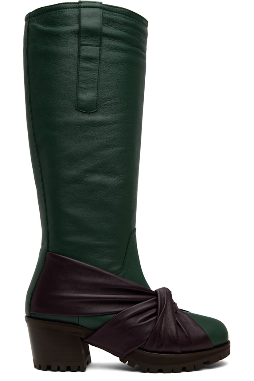 Handcrafted mid-calf nappa calfskin boots in green and purple.

· Knotted accent at vamp
· Logo embossed at inner side
· Pull-loops at collar
· Buffed leather lining 
· Stacked leather midsole and block heel 
· Treaded rubber sole 
· Heel: H2.5"

Supplier color: Wood green/Aubergine/Brown