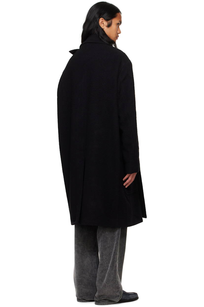 Brushed wool-blend melton coat.

· Notched lapel
· Double-breasted button closure
· Welt and flap pockets
· Central vent at back hem
· Welt pocket at interior
· Full satin twill lining

Supplier color: Black Casentino