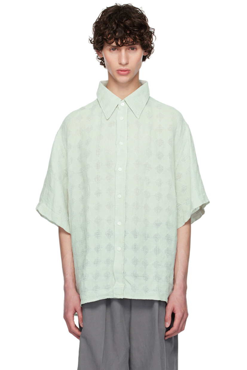 Linen hopsack shirt. Jacquard argyle pattern throughout.

· Spread collar
· Button closure
· Shirttail hem
· Dropped shoulders
· Box pleat at back yoke

Supplier color: Ice blue