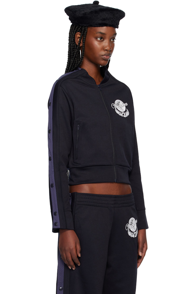 Polyester- and cotton-blend interlock jersey track jacket.

· Rib-knit stand collar, hem, and cuffs
· Zip closure
· Logo graphic printed at chest
· Zip pockets
· Mesh trim and press-stud vent at sleeves

Supplier color: Navy