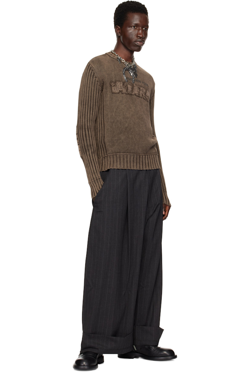 Knit cotton sweater. Fading and rib-knit trim throughout. 

· Crewneck
· Text printed at chest
· Logo appliqué with frayed edges at chest

Supplier color: Brown