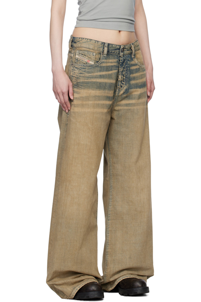Stonewashed non-stretch denim jeans. Hand-brushed fading and whiskering throughout. 

· Relaxed-fit and wide-leg
· Low-rise
· Belt loops 
· Five-pocket styling 
· Button-fly 
· Logo patch at coin pocket 
· Leather logo patch at back waistband 
· Logo-engraved gunmetal-tone hardware 

Supplier color: Medium blue