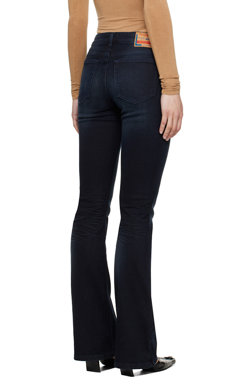 Slim-fit coated stretch cotton-blend denim jeans. Fading, whiskering, and subtle distressing throughout. 

· Low-rise
· Belt loops 
· Five-pocket styling 
· Zip fly 
· Logo patch at coin pocket 
· Jacron logo patch at back waistband 
· Logo-engraved silver-tone hardware

Supplier color: Dark blue