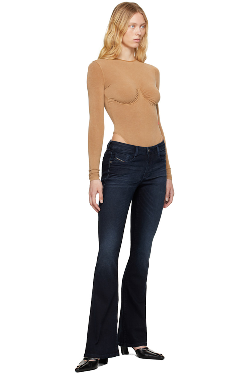 Slim-fit coated stretch cotton-blend denim jeans. Fading, whiskering, and subtle distressing throughout. 

· Low-rise
· Belt loops 
· Five-pocket styling 
· Zip fly 
· Logo patch at coin pocket 
· Jacron logo patch at back waistband 
· Logo-engraved silver-tone hardware

Supplier color: Dark blue