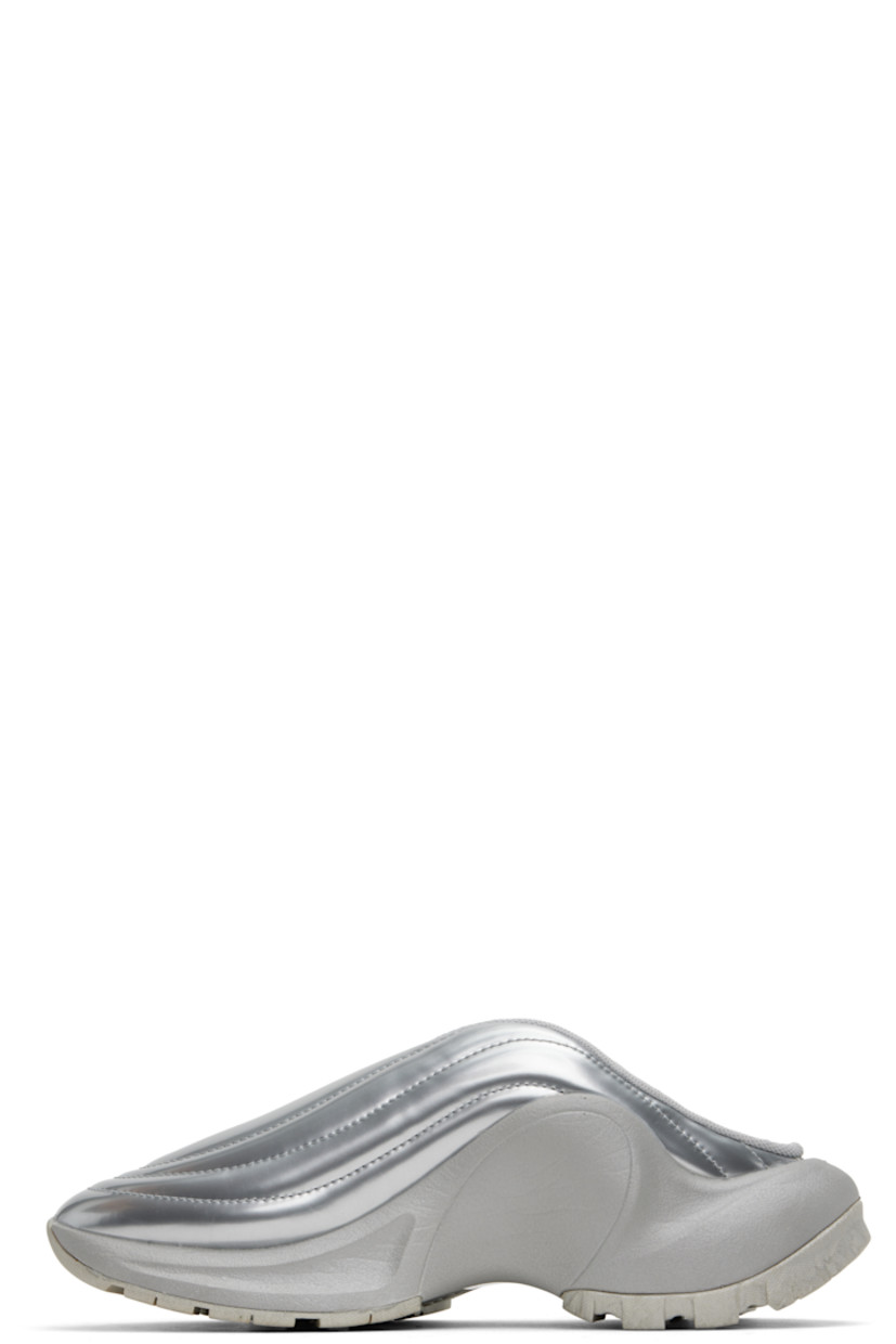 Low-top patent faux-leather slip-on sneakers in silver tone.

· Quilted and padded
· Mesh lining
· Logo embossed at foam rubber midsole
· Treaded rubber sole

Supplier color: Silver