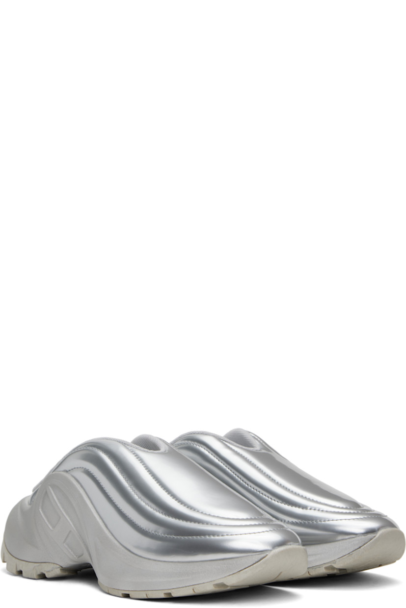 Low-top patent faux-leather slip-on sneakers in silver tone.

· Quilted and padded
· Mesh lining
· Logo embossed at foam rubber midsole
· Treaded rubber sole

Supplier color: Silver