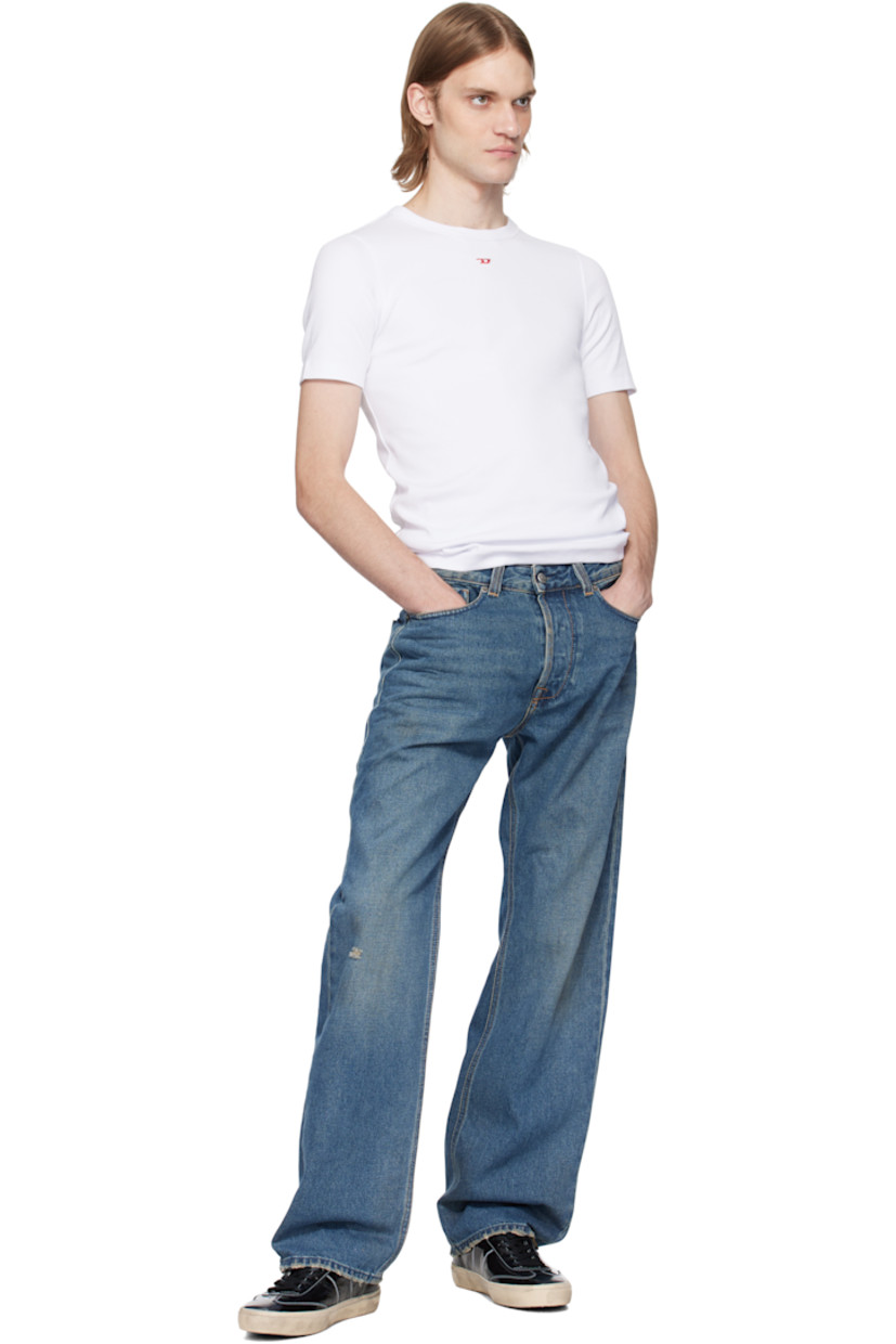 Straight-leg non-stretch denim jeans. Fading, whiskering, and distressing throughout. 

· Mid-rise
· Belt loops 
· Five-pocket styling 
· Button fly 
· Logo patch at coin pocket 
· Jacron patch at back waistband 
· Logo-engraved gunmetal-tone hardware

Supplier color: Medium blue
