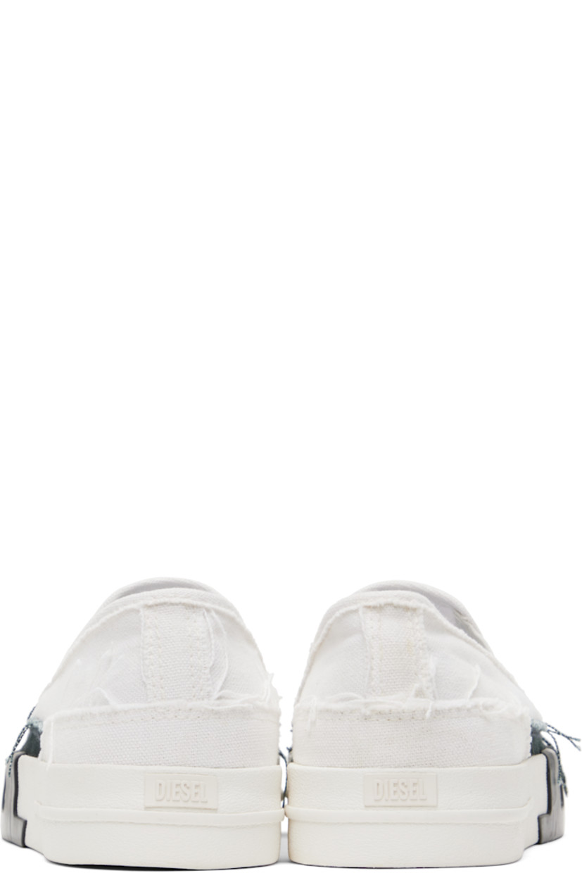 Low-top canvas slip-on sneakers in white.

· Frayed edges throughout
· Rubber cap toe
· Elasticized gussets at vamp
· Rubberized logo patch at heel
· Logo bonded at midsole
· Treaded rubber sole

Supplier color: White