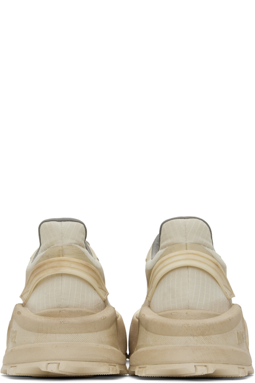 Low-top coated ripstop sneakers in beige.

· Fading and bonded trim throughout
· Cord-lock lace-up closure
· Logo bonded at padded tongue
· Padded collar
· Rubberized pull-loop at heel counter
· Jersey and mesh lining
· Logo embossed at platform midsole
· Treaded rubber sole
· Platform: H2"

Supplier color: Beige