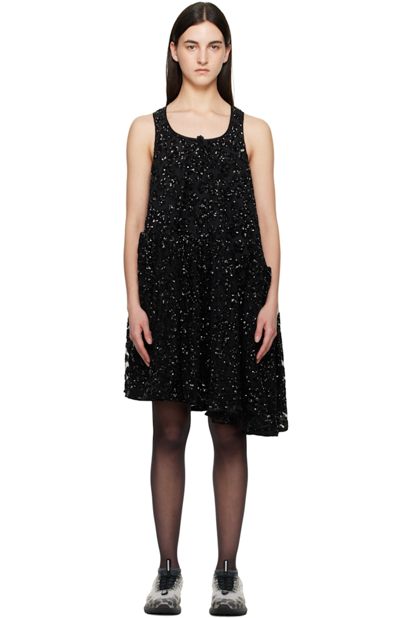 Polyester tulle minidress. Sequinned floral appliqués throughout.

· Bungee-style drawstring at scoop neck
· Gathering at waist
· Asymmetrical hem
· Full silk-blend crêpe lining

Supplier color: Black