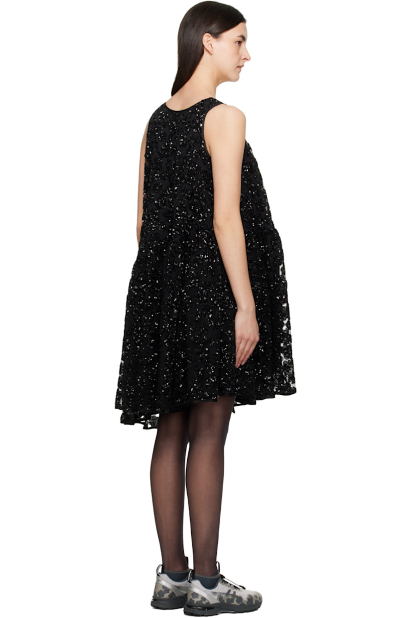 Polyester tulle minidress. Sequinned floral appliqués throughout.

· Bungee-style drawstring at scoop neck
· Gathering at waist
· Asymmetrical hem
· Full silk-blend crêpe lining

Supplier color: Black