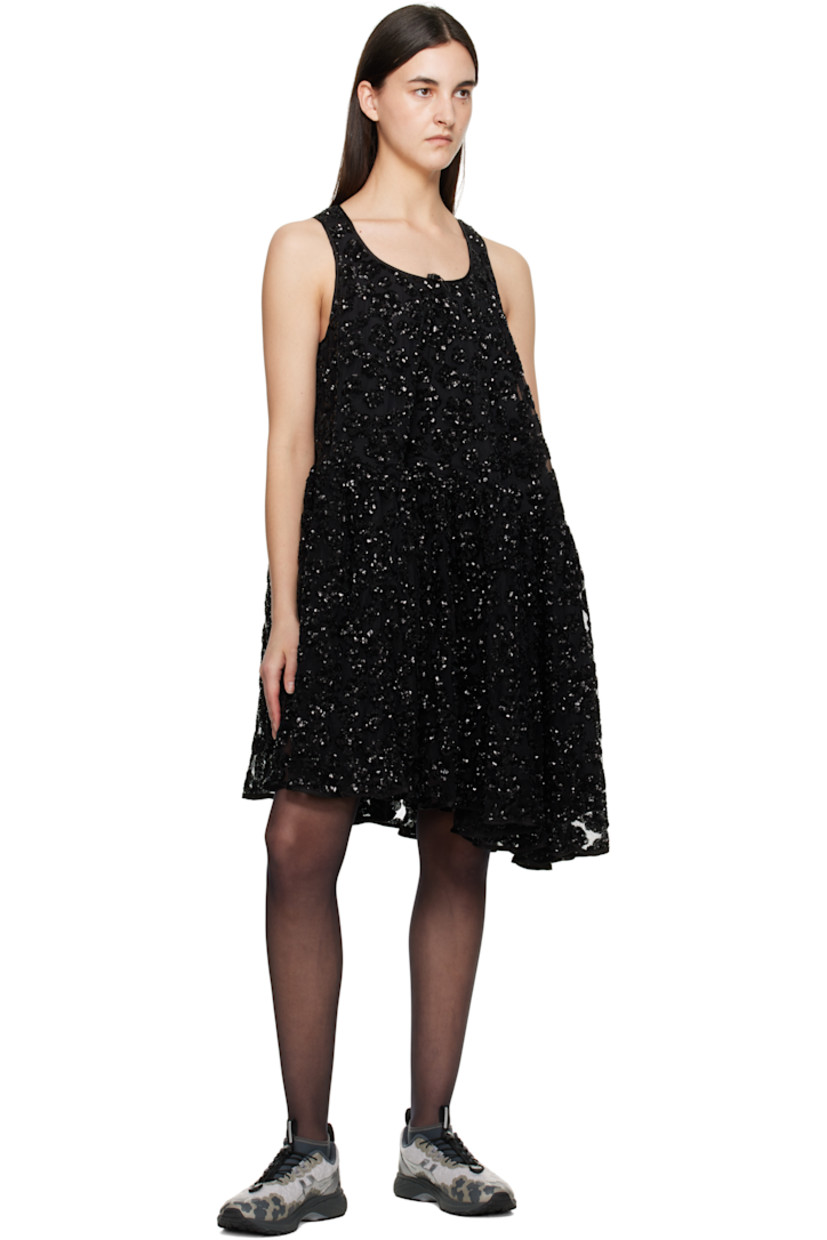 Polyester tulle minidress. Sequinned floral appliqués throughout.

· Bungee-style drawstring at scoop neck
· Gathering at waist
· Asymmetrical hem
· Full silk-blend crêpe lining

Supplier color: Black