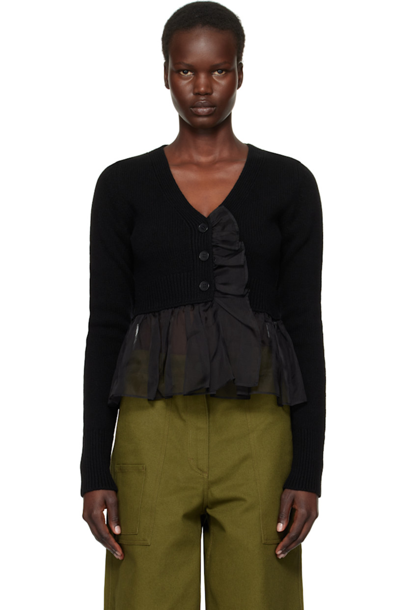 Knit cashmere- and wool-blend cardigan. Sheer silk organza trim at placket and peplum hem.

· Rib-knit V-neck, placket, hem, and cuffs
· Button closure
· Cropped hem

Supplier color: Black