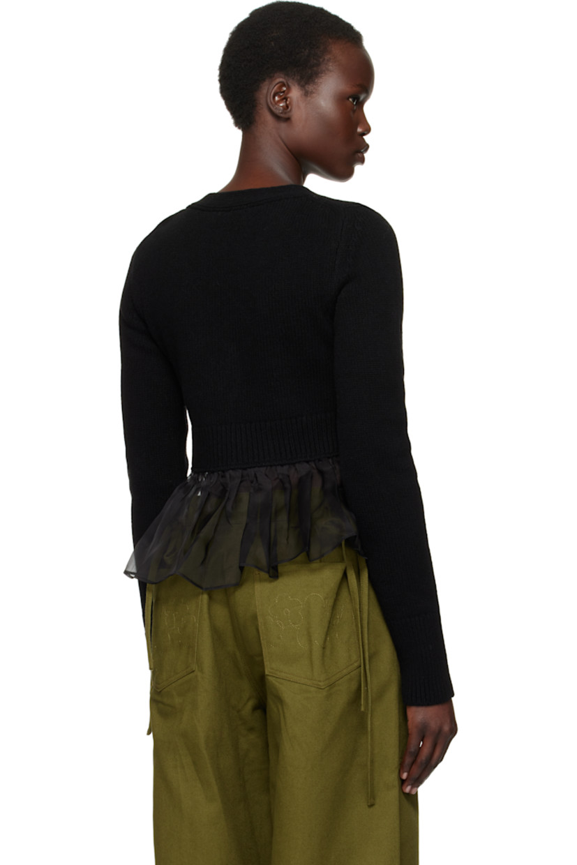 Knit cashmere- and wool-blend cardigan. Sheer silk organza trim at placket and peplum hem.

· Rib-knit V-neck, placket, hem, and cuffs
· Button closure
· Cropped hem

Supplier color: Black