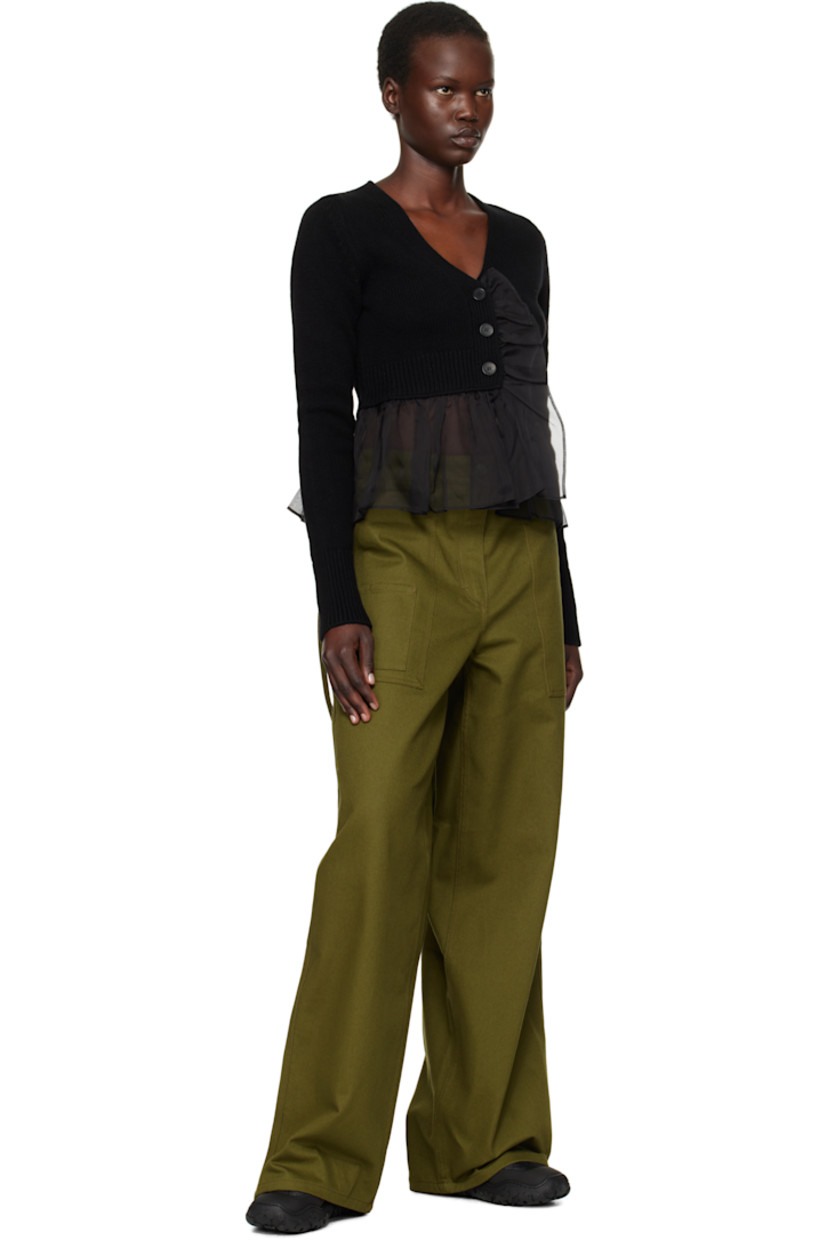 Knit cashmere- and wool-blend cardigan. Sheer silk organza trim at placket and peplum hem.

· Rib-knit V-neck, placket, hem, and cuffs
· Button closure
· Cropped hem

Supplier color: Black