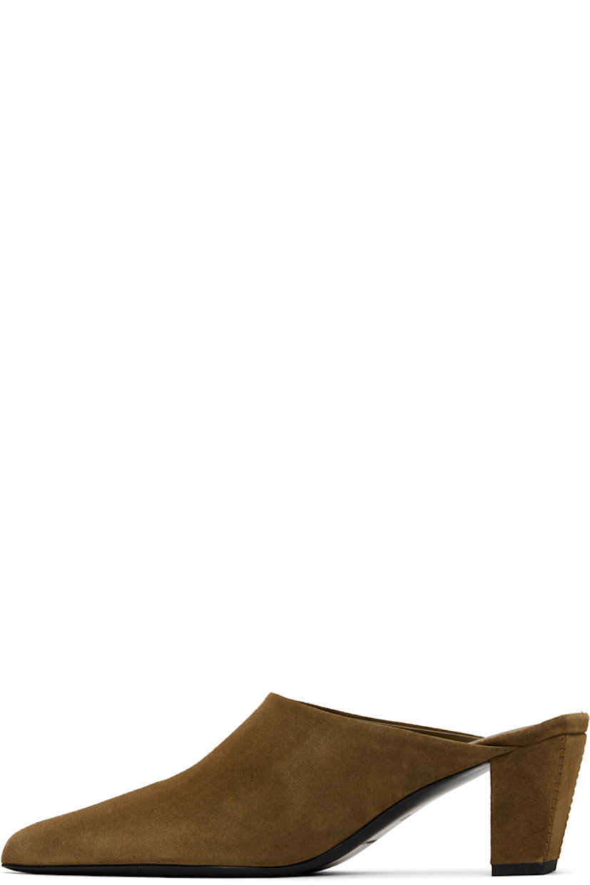 Calfskin suede mules in brown.

· Pointed toe
· Grained goatskin lining
· Covered block heel with rubber injection
· Leather sole
· Heel: 2.25"

Supplier color: Camel