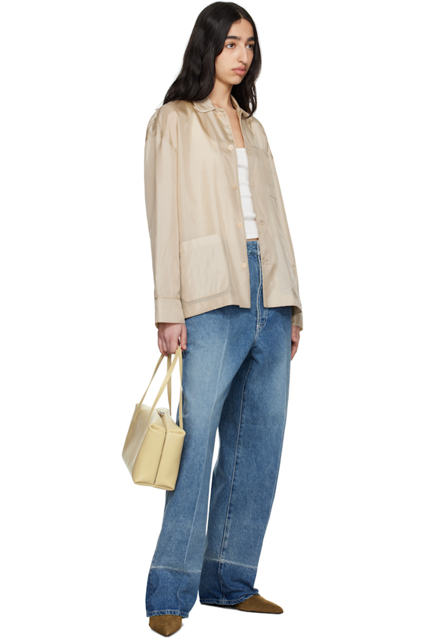 Calfskin suede mules in brown.

· Pointed toe
· Grained goatskin lining
· Covered block heel with rubber injection
· Leather sole
· Heel: 2.25"

Supplier color: Camel