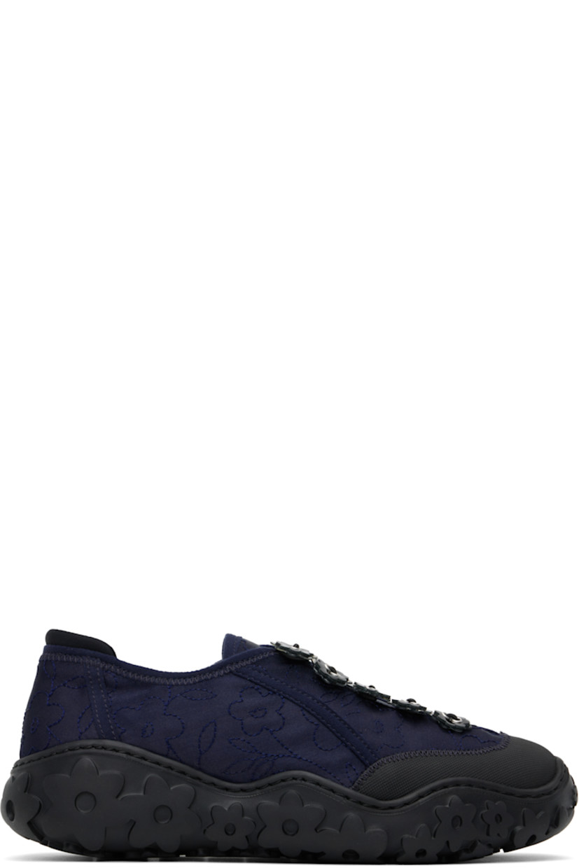 Low-top satin sneakers in navy.

· Positive Luxury Butterfly Mark-certified
· Floral pattern embroidered throughout
· Textured rubber cap toe
· Floral appliqués at toggle closure 
· Bonded jersey trim at heel collar
· Logo patch at footbed
· Microfibre lining
· Floral pattern embossed at rubber sole

Supplier color: Dark blue