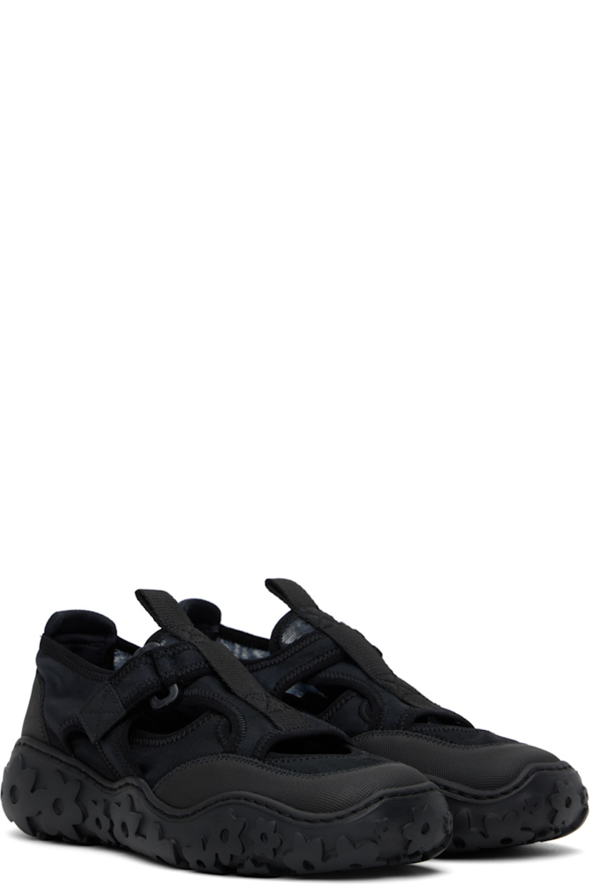 Low-top semi-sheer mesh sneakers in black.

· Positive Luxury Butterfly Mark-certified
· Cutouts and rubberized trim throughout 
· Square toe 
· Pull-loop at tongue
· Padded collar
�· Velcro fastening at outer side
· Logo patch at microfibre footbed  
· Floral pattern embossed at rubber sole 

Supplier color: Black