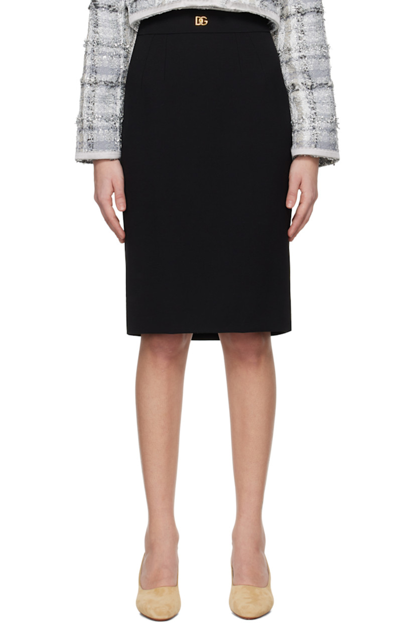 Wool crêpe midi skirt.

· Logo hardware at waistband
· Zip closure at back
· Central vent at back hem
· Full stretch silk satin lining

Supplier color: Nero