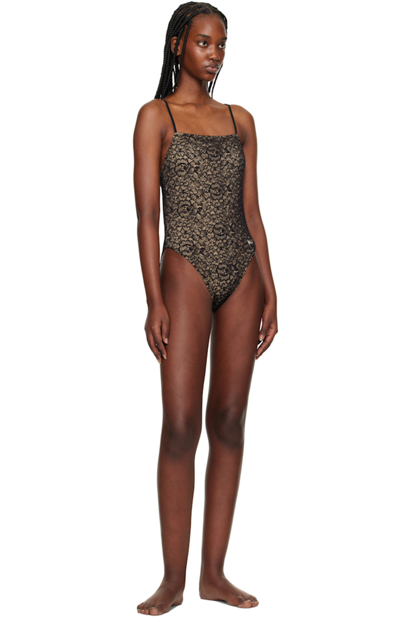 Stretch nylon- and cotton-blend jersey one-piece swimsuit. Jacquard floral pattern at stretch nylon lace overlay. 

· Straight neck
· Adjustable shoulder straps
· Logo hardware at front 
· Crisscrossing straps at low back

Supplier color: Black
