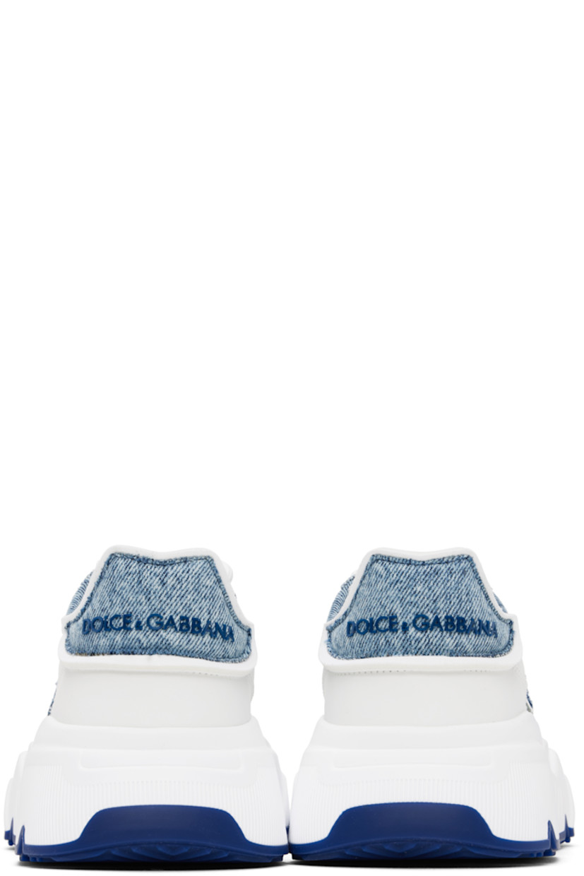Low-top buffed nappa calfskin and denim sneakers in blue and white.

· Cord-lock lace-up closure
· Logo patch at padded tongue
· Padded collar
· Logo appliqué at outer side
· Logo embossed at heel tab
· Grained lambskin and suede lining
· Foam rubber midsole
· Treaded rubber sole

Supplier color: Bianco/Panna
