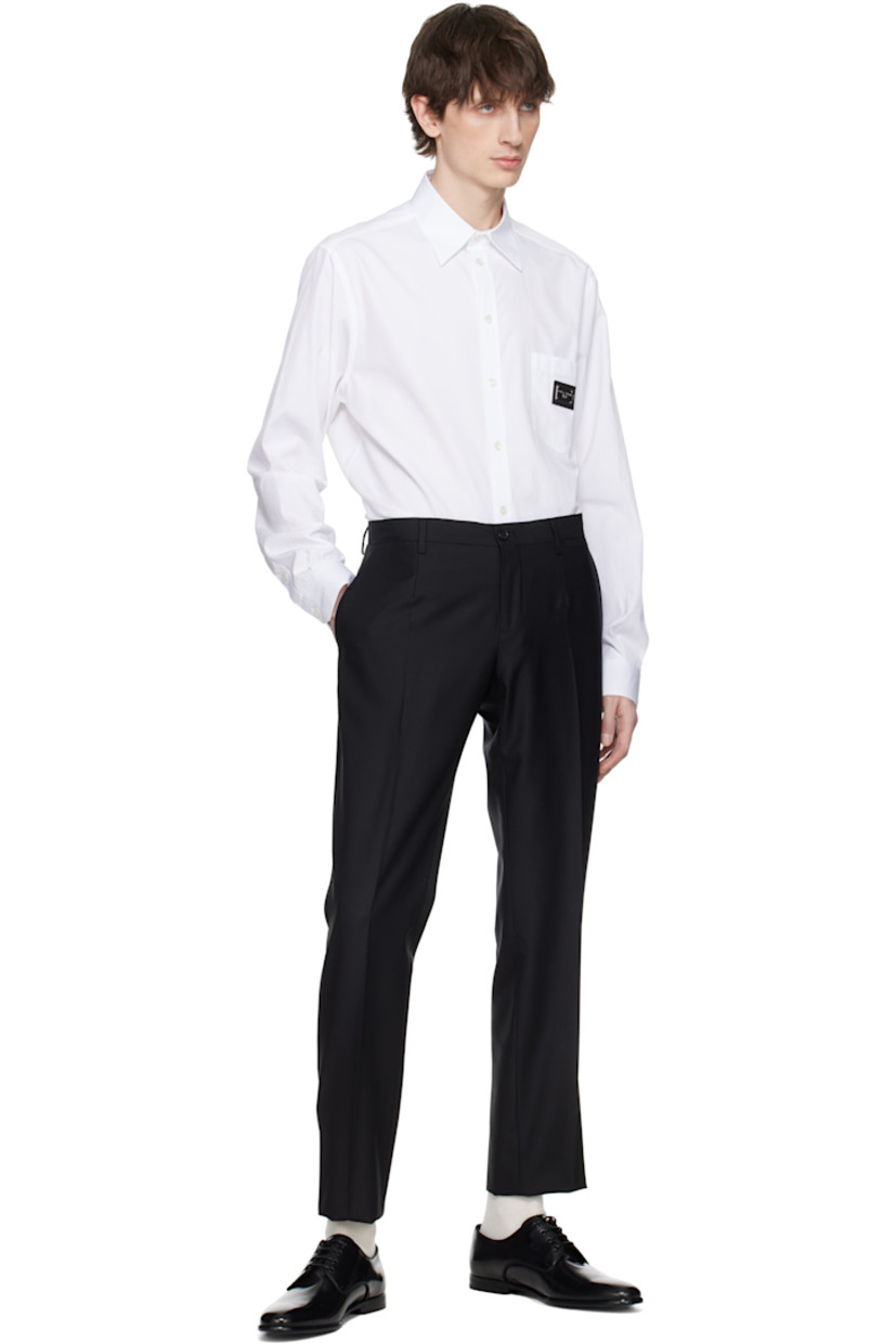 Cotton poplin shirt.

· Spread collar
· Button closure
· Patch pocket 
· Logo plaque with leather trim at chest
· Pleats at single-button barrel cuffs
· Box pleat at back yoke

Part of the Essential collection

Supplier color: Bianco ottico