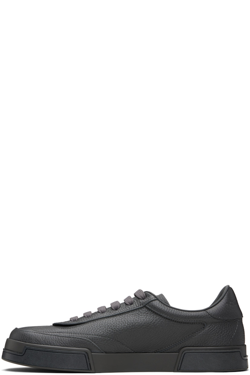 Low-top grained calfskin sneakers. 

· Lace-up closure
· Padded tongue and collar
· Logo embossed at tongue and heel tab
· Lambskin and goatskin lining
· Logo embossed at midsole 
· Treaded rubber sole 

Supplier color: Grigio/Nero