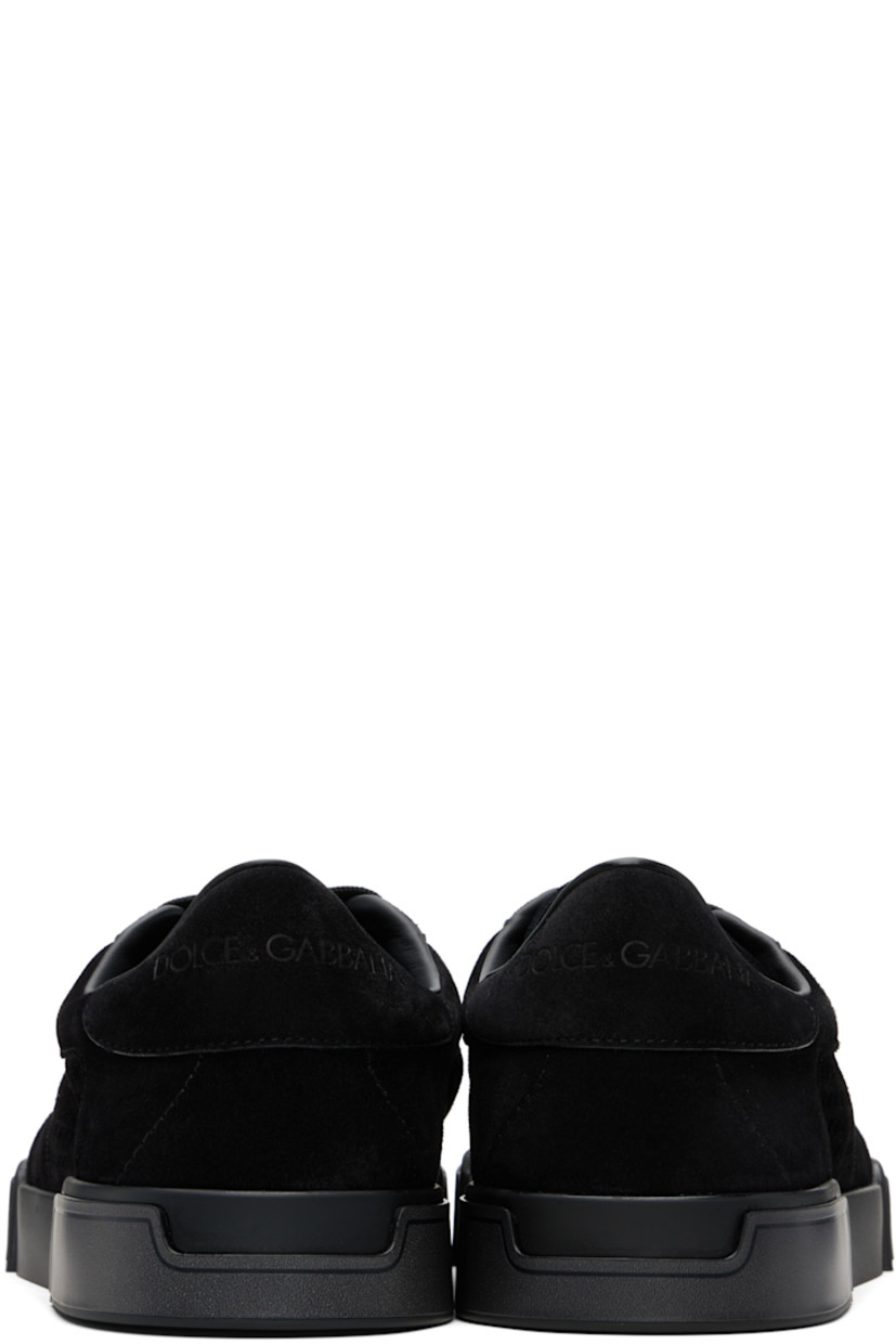 Low-top calfskin suede sneakers.

· Perforations throughout 
· Lace-up closure
· Padded tongue and collar
· Logo embossed at tongue and heel tab
· Lambskin and goatskin lining
· Logo embossed at midsole 
· Treaded rubber sole 

Supplier color: Black
